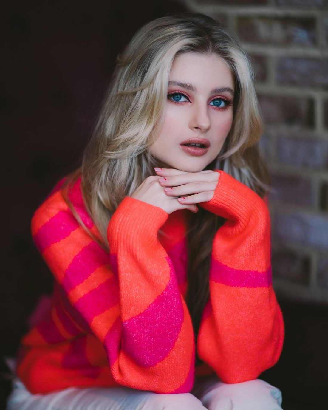 Close portrait of a model in a striped knit